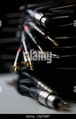 Set of high quality audio cables in music store. Stock of 6.3 mm jack to xlr connectors Stock Photo