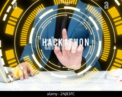Writing displaying text Hackathon. Word for event where large number of people engage in programming Stock Photo