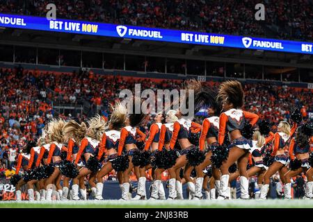 September 18, 2022: Denver Broncos running back Javonte Williams (33)  hurdles Houston Texans cornerback Desmond King II (25) in the football game  between the Denver Broncos and Houston Texans at Empower Field Field in  Denver, CO. Denver hung