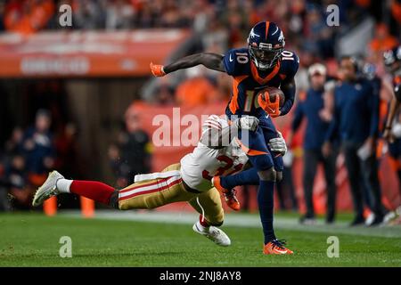 September 18, 2022: Denver Broncos running back Javonte Williams (33)  hurdles Houston Texans cornerback Desmond King II (25) in the football game  between the Denver Broncos and Houston Texans at Empower Field