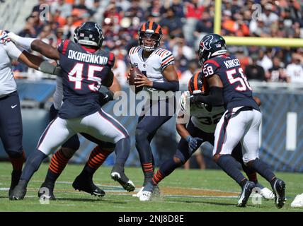 Chicago Bears tight end Cole Kmet is hit by Washington Commanders  linebacker Jamin Davis after a catch in the first half of an NFL football  game in Chicago, Thursday, Oct. 13, 2022. (