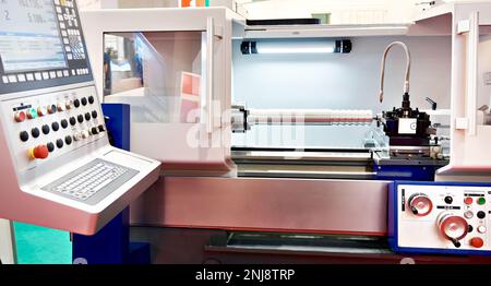 Steel product in the CNC lathe Stock Photo