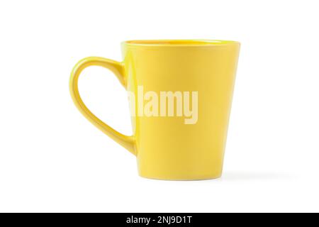 Yellow ceramic glass close-up isolated on white background Stock Photo