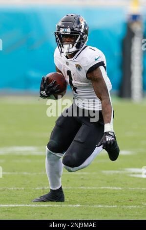 December 18, 2022: Jacksonville Jaguars running back TRAVIS ETIENNE JR. (1)  runs onto the field during the Jacksonville Jaguars vs Dallas Cowboys NFL  game at TIAA Bank Field Stadium in Jacksonville, Fl