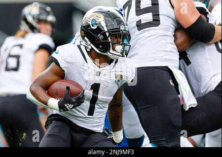 December 18, 2022: Jacksonville Jaguars running back TRAVIS ETIENNE JR. (1)  runs onto the field during the Jacksonville Jaguars vs Dallas Cowboys NFL  game at TIAA Bank Field Stadium in Jacksonville, Fl