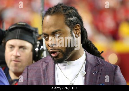 Former NFL player Richard Sherman talks in the  Prime Video broadcast  booth before a preseason NFL football game between the Los Angeles Rams and  the Houston Texans Friday, Aug. 19, 2022