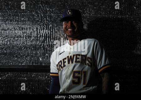 Milwaukee Brewers' Freddy Peralta poses for a picture with a cheesehead at  the team's photo day at spring training Wednesday, Feb. 22, 2023, in  Phoenix. (AP Photo/Morry Gash Stock Photo - Alamy