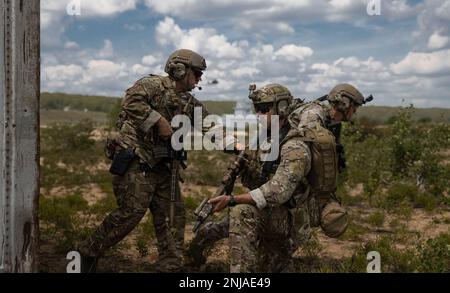 Operators from the 20th Special Forces Group conduct an aerial assault mission during a training exercise near Chester Township, Michigan, on August 6, 2022. The mission was part of Northern Strike, an annual multinational joint training event headquartered at the Camp Grayling Joint Maneuver Training Center in Michigan. Stock Photo