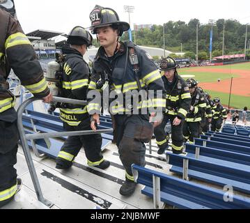 Cleveland firefighter Mike Ruebusch walks up the stairs during the  Chattanooga 9/11 Memorial Stair Climb on Sunday, Sept. 11, 2022, at AT&T  Field in Chattanooga, Tenn. Participants walked all the stairs in
