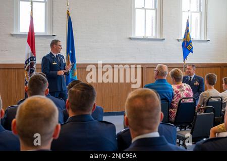 Col. William Wirth, 157th Air Intelligence Squadron Commander speaks on behalf of Lt. Col. William Skaggs, director of operations for the 157th Air Intelligence Squadron, during his retirement ceremony, Aug. 6, 2022, at Jefferson Barracks Air National Guard Base, St. Louis, Missouri. Skaggs served for 37 years. Stock Photo