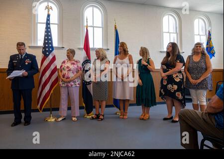 Lt. Col. William Skaggs, director of operations for the 157th Air Intelligence Squadron, recognizes the strong women in his family, during his retirement ceremony, Aug. 6, 2022, at Jefferson Barracks Air National Guard Base, St. Louis, Missouri. Skaggs served for 37 years. Stock Photo