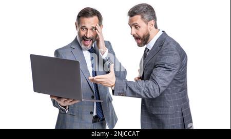 shocked businessmen freelancer in studio. photo of businessmen freelancer with laptop Stock Photo