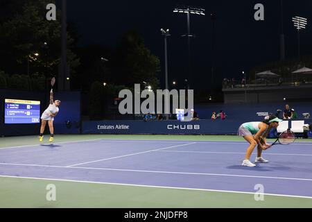 Sara Saito and Charlotte Kempenaers-Pocz in action during a junior ...