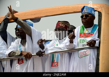 Lagos, Nigeria February 21, 2023 L-R: Hon. Femi Gbajabiamila, Speaker, House of Representatives; Bola Ahmed Tinubu, Presidential candidate, All Progressives Congress (APC), and Senator Kashim Shettima, Vice Presidential candidate, in a campaign bus in Lagos. Asiwaju Bola Ahmed Tinubu, Presidential candidate, All Progressives Congress (APC) for 2023 Elections holds grand finale of his campaign at the Teslim Balogun Stadium in Surulere, Lagos on Tuesday, February 21, 2023. Photo by Adekunle Ajayi Stock Photo