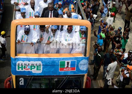 Lagos, Nigeria February 21, 2023 L-R: Senator Ahmad Lawan, Senate President; Dapo Abiodu, Governor, Ogun State; Hon. Femi Gbajabiamila, Speaker, House of Representatives; Bola Ahmed Tinubu, Presidential candidate, All Progressives Congress (APC), and Senator Kashim Shettima, Vice Presidential candidate, in a campaign bus in Lagos. Asiwaju Bola Ahmed Tinubu, Presidential candidate, All Progressives Congress (APC) for 2023 Elections holds grand finale of his campaign at the Teslim Balogun Stadium in Surulere, Lagos on Tuesday, February 21, 2023. Photo by Adekunle Ajayi Stock Photo