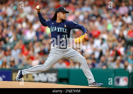 CLEVELAND, OH - SEPTEMBER 02: Seattle Mariners center fielder Julio  Rodriguez (44) puts the home run helmet on Seattle Mariners catcher Cal  Raleigh (29) after Raliegh hit his second home run of