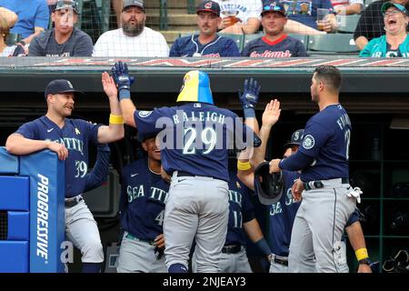 Cal Raleigh of the Seattle Mariners is congratulated by teammates