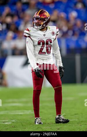 A Washington Commanders helmet rests on the field before a preseason NFL  football game between the Commanders and the Baltimore Ravens, Saturday,  Aug. 27, 2022, in Baltimore. (AP Photo/Julio Cortez Stock Photo 