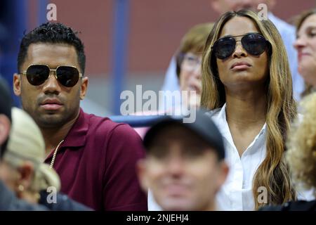 Russell Wilson and Ciara during a women's singles match at the