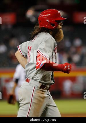 Philadelphia Phillies' Brandon Marsh takes off a batting glove after  striking out against the Arizona Diamondbacks during the third inning of a  baseball game Thursday, June 15, 2023, in Phoenix. (AP Photo/Ross