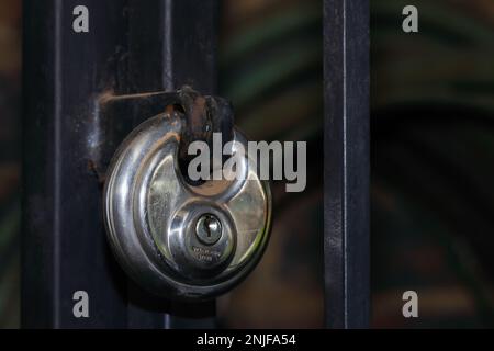 Access Gate Secured With Round Stainless Steel Lock Stock Photo