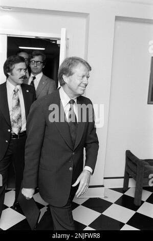 President Jimmy Carter leaves a meeting with White House Counsel ROBERT LIPSHUTZ Stock Photo