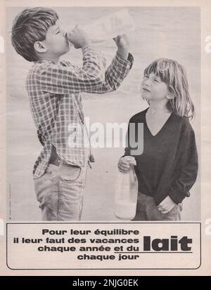 Girl and boy drinking milk - vintage milk advertisement Lait publicite Stock Photo