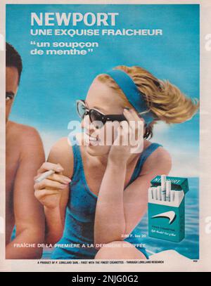 newport cigarettes careers Newton cigarettes vintage magazine advert Newport cigarettes advertisement  blond woman smoking Newport cigarette Stock Photo