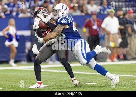 Detroit Lions running back Godwin Igwebuike (35) breaks a tackle by  Indianapolis Colts linebacker James Skalski (48) during an NFL football  game, Saturday, Aug. 20, 2022, in Indianapolis. (AP Photo/Zach Bolinger  Stock Photo - Alamy