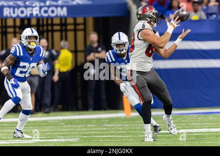 Indianapolis Colts safety Rodney Thomas II (25) tackles Tampa Bay Buccaneers  tight end Cade Otton (88) in the first half of an NFL preseason football  game in Indianapolis, Saturday, Aug. 27, 2022. (