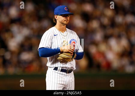 CHICAGO, IL - AUGUST 23: Chicago Cubs second basemen Zach McKinstry (6)  hits a single in the third inning during game 1 of a doubleheader between  the St. Louis Cardinals and Chicago