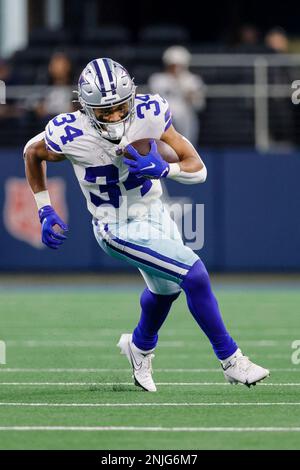 ARLINGTON, TX - DECEMBER 11: Dallas Cowboys RB Malik Davis runs during a  special teams play during the game featuring the Houston Texans and the  Dallas Cowboys on December 11, 2022 at