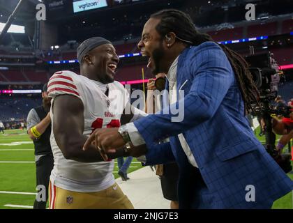 HOUSTON, TX - AUGUST 25: San Francisco 49ers wide receiver Deebo Samuel  (19) chats with  TNF commentator and former NFL cornerback Richard  Sherman during the NFL game between the San Francisco