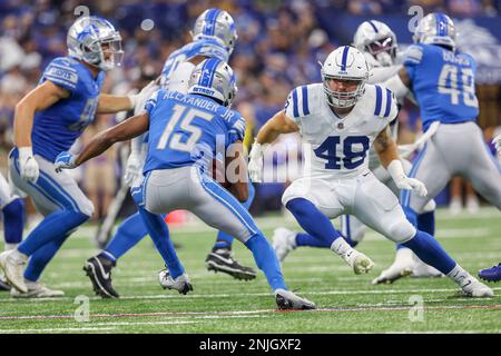 Detroit Lions running back Godwin Igwebuike (35) breaks a tackle by  Indianapolis Colts linebacker James Skalski (48) during an NFL football  game, Saturday, Aug. 20, 2022, in Indianapolis. (AP Photo/Zach Bolinger  Stock Photo - Alamy