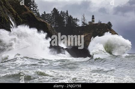 WA23056-00...WASHINGTON - Composite image of waves on a stormy day along the Pacific Coast near the entrance to the Columbia River in a cove below Cap Stock Photo