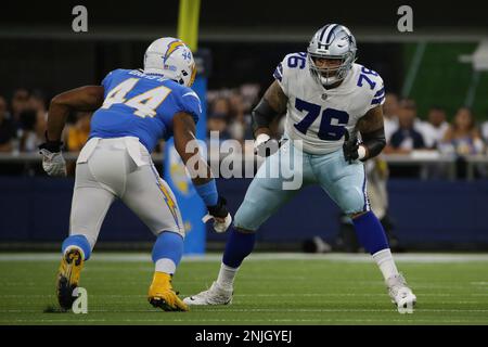 Dallas Cowboys offensive tackle Aviante Collins (76) stands on the