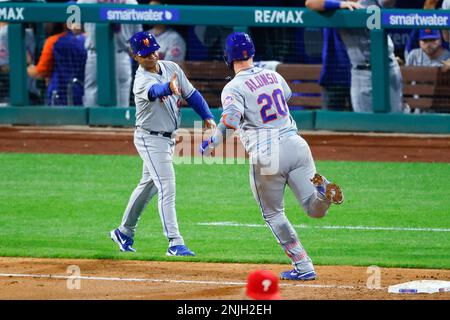 WASHINGTON, DC - August 03: New York Mets first baseman Pete Alonso (20) is  congratulated by third base coach Joey Cora (56) after his home run during  the New York Mets versus