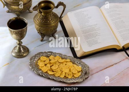 Christian Holy Communion with unleavened bread chalice wine an symbols of Jesus Christ Stock Photo