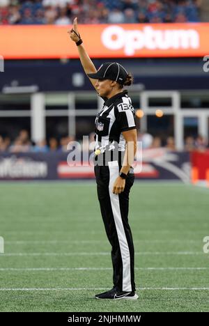 FOXBOROUGH, MA - AUGUST 11: Side judge Allan Baynes (56) confers