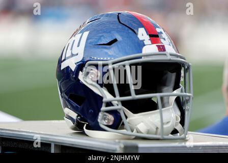 The New York Giants logo is seen on helmets at the bench during an NFL  preseason football game against the New England Patriots at Gillette  Stadium, Thursday, Aug. 11, 2022 in Foxborough