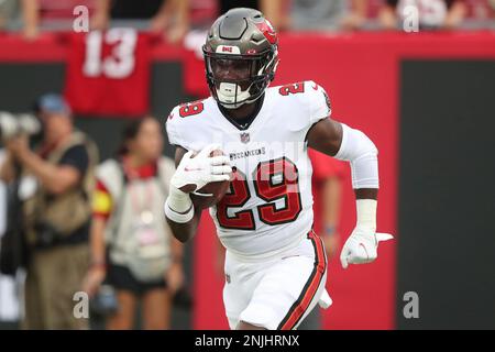 TAMPA, FL - AUGUST 13: Tampa Bay Buccaneers runningback Rachaad White (29)  warms up before the preseason game between the Miami Dolphins and the Tampa Bay  Buccaneers on August 13, 2022 at Raymond James Stadium in Tampa, Florida