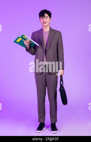 handsome Korean young man studying english Stock Photo
