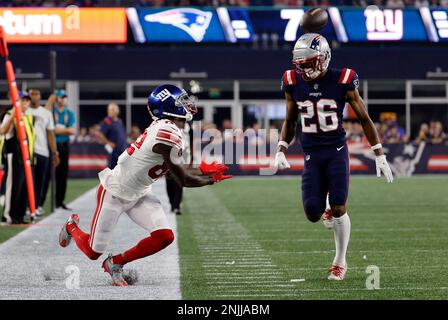 FOXBOROUGH, MA - AUGUST 11: the pass hits the helmet of New England Patriots  cornerback Shaun Wade (26) during an NFL preseason game between the New  England Patriots and the New York Giants on August 11, 2022, at Gillette  Stadium in