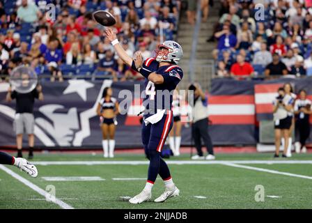 FOXBOROUGH, MA - AUGUST 11: New England Patriots quarterback Bailey Zappe  (4) tosses a pass during an NFL preseason game between the New England  Patriots and the New York Giants on August