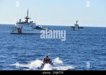 A USCGC Dependable (WMEC 626) small boat crew operates alongside USCGC Legare (WMEC 912) and USCGC Valiant (WMEC 621) in support of Operation Vigilant Sentry off the coast of Haiti, Jan. 27, 2023. Dependable’s crew patrolled the Coast Guard’s Seventh District area of operations to conduct maritime safety and security missions. (U.S. Coast Guard photo by Ensign Hannah Jamison) Stock Photo