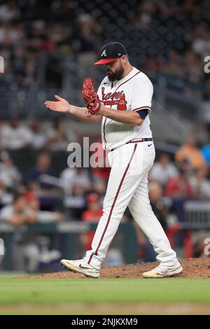 ATLANTA, GA - AUGUST 02: Atlanta Braves relief pitcher Jackson Stephens  (53) slaps his glove after the final out of the Tuesday evening MLB game  between the Atlanta Braves and the Philadelphia Phillies on August 2, 2022  at Truist Park in Atlanta