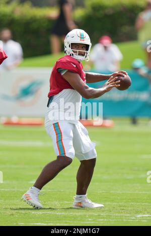 MIAMI GARDENS, FL - AUG 2: Miami Dolphins quarterback Tua Tagovailoa (1)  throws passes during the Miami Dolphins training camp on Tuesday, August 2,  2022 at Baptist Health Training Center in Miami Gardens, FL (Photo by Peter  Joneleit/Icon