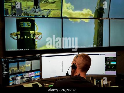 A Firefly Aerospace employee monitors computer data in preparation for a static fire of the Firefly Alpha 002 rocket at Vandenberg Space Force Base, Calif., Aug. 08, 2022. Prior to launch, a static fire was conducted on the Alpha 002 to determine the fitness of the rocket system. Firefly Aerospace,Static Fire,Vandenberg,Vandenberg Firefly,irefly Static Fire, Stock Photo