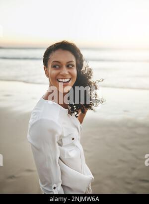 Mature woman enjoying herself on the beach Stock Photo - Alamy