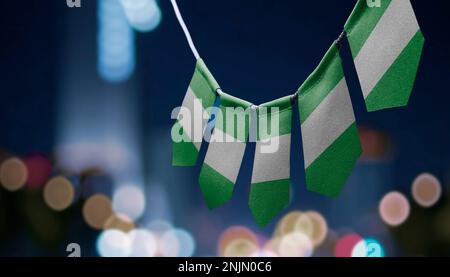 Small national flags of the Nigeria on a white background Stock Photo ...
